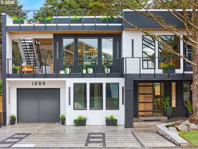 Discover a unique, custom-built home on the beachside, offering - photo 5