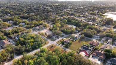 GREAT INVESTMENT PROPERTY! This large corner lot is zoned for 10 - photo 10