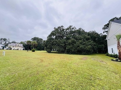 Build your coastal retreat in The Oaks at Winyah Bay, a charming - photo 1