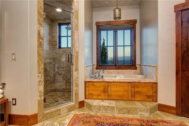 Set on over 15 acres with sweeping valley views, this Cove - photo 12
