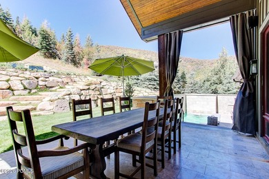 Set on over 15 acres with sweeping valley views, this Cove - photo 23