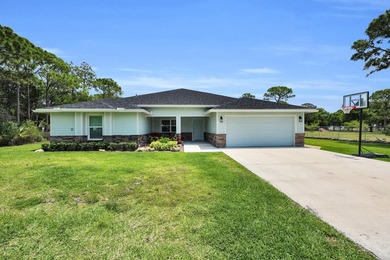 Welcome to this one-of-a-kind custom estate located in the - photo 1