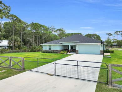 Welcome to this one-of-a-kind custom estate located in the - photo 2