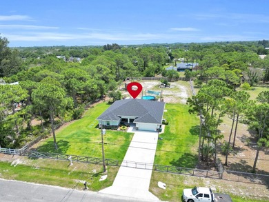Welcome to this one-of-a-kind custom estate located in the - photo 3
