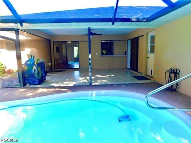 Imagine sitting by the pool of your 3-bedroom home, enjoying the - photo 2