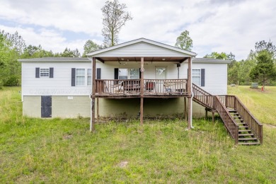 Smith Lake (Sipsey) A 3BR/2BA manufactured home tucked away in a - Lake Home For Sale in Double Springs, Alabama
