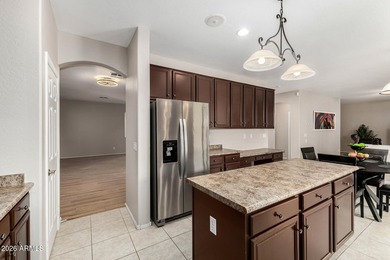 A 5-bed, 3-bath home in the Villages at Queen Creek with 3,237 - photo 11