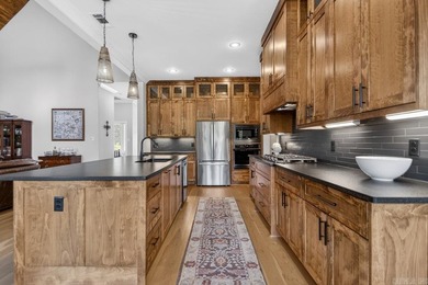Experience contemporary living in this stunning custom-built - photo 12