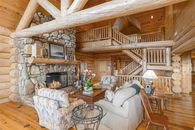 Perched atop over 12 secluded acres, this majestic log cabin - photo 20