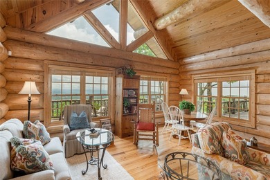 Perched atop over 12 secluded acres, this majestic log cabin - photo 21