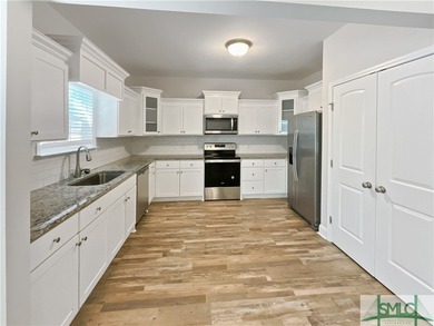 Discover Your Modern Oasis in Downtown Darien! Step into this - photo 2