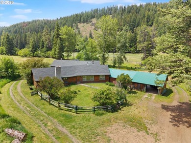 A rare legacy property on the Wallowa Mountain Loop Road, this - photo 2