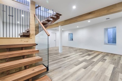 Just moments from the beach, this architecturally striking East - photo 25