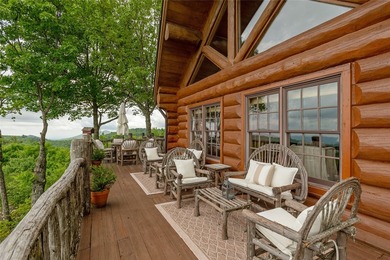 Perched atop over 12 secluded acres, this majestic log cabin - photo 41