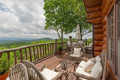 Perched atop over 12 secluded acres, this majestic log cabin - photo 42