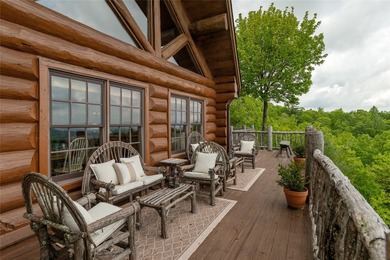 Perched atop over 12 secluded acres, this majestic log cabin - photo 43