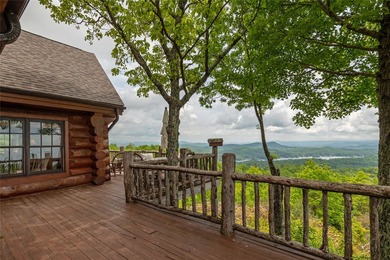 Perched atop over 12 secluded acres, this majestic log cabin - photo 46