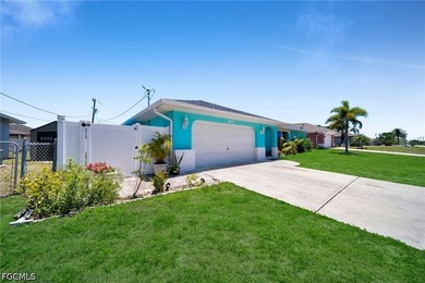 Beautiful pool home with a large backyard in Southwest Cape - photo 2