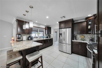 Beautiful pool home with a large backyard in Southwest Cape - photo 8