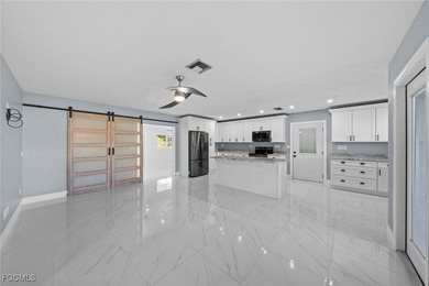 Completely remodeled and move-in ready, this beautiful river - photo 2
