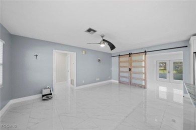 Completely remodeled and move-in ready, this beautiful river - photo 3
