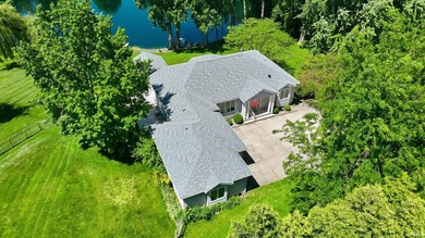 Welcome to this beautifully designed ranch home situated on a - photo 3