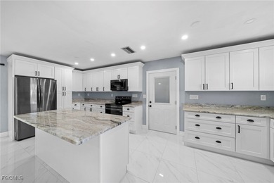Completely remodeled and move-in ready, this beautiful river - photo 4