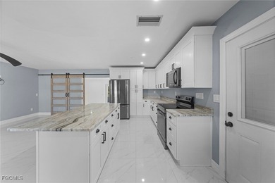 Completely remodeled and move-in ready, this beautiful river - photo 8