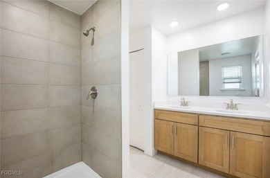 Set on a cul-de-sac with tranquil water-view pond vistas, this - photo 8
