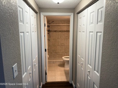 Step inside to find tile flooring flowing throughout the main - photo 16