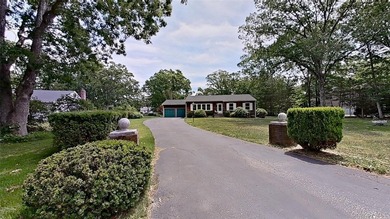 A GREAT BUY situated on a large, private lot, convenient to all! - photo 1