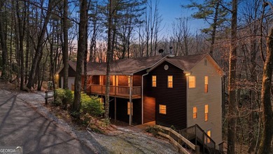 This completely remodeled 4-bedroom, 3.5-bathroom home sits off - photo 1