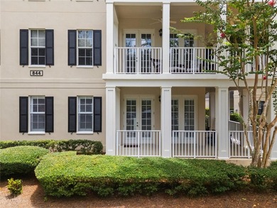Experience the charm of Celebration from this rare first-floor - photo 1