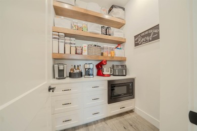 Welcome to elevated living in this stunning custom-built home - photo 13