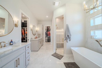 Welcome to elevated living in this stunning custom-built home - photo 18