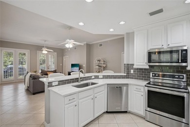 Experience the charm of Celebration from this rare first-floor - photo 10