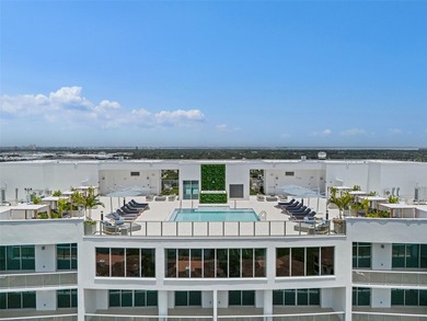Never-occupied corner condominium at AQUA at Westshore Yacht - photo 2