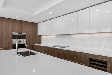 Never-occupied corner condominium at AQUA at Westshore Yacht - photo 3
