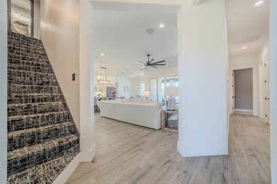 Welcome to elevated living in this stunning custom-built home - photo 23
