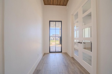 Welcome to elevated living in this stunning custom-built home - photo 28