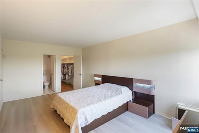 Corner end unit! Spacious two-bedroom, two-bathroom residence in - photo 9