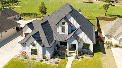 Welcome to elevated living in this stunning custom-built home - photo 46