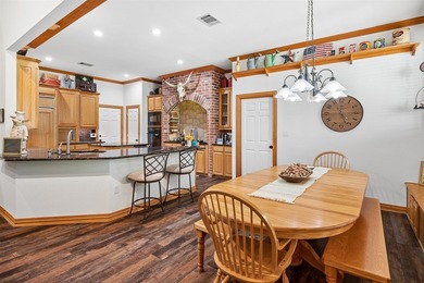 Nestled on a beautifully maintained, heavily treed one-acre - photo 10