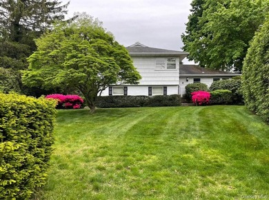 Welcome to this beautifully maintained split-level home located - photo 2