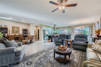 Stunning home in the highly desirable gated 55+ community