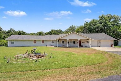 Located in the desirable Boatman area of Pryor, this 3-bedroom - photo 1