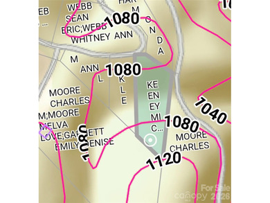 Tucked inside the gated community of Riverbend at Lake Lure