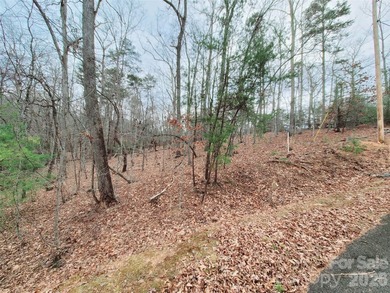 Tucked inside the gated community of Riverbend at Lake Lure