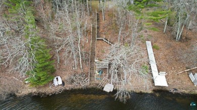 Discover this inviting 4-bedroom, 1-bath home on 3.26 wooded - photo 4