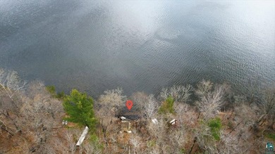 Discover this inviting 4-bedroom, 1-bath home on 3.26 wooded - photo 5